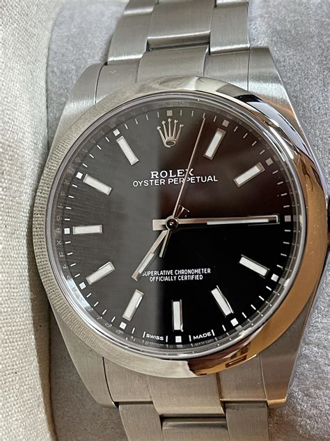 rolex perpetual 39 black dial|rolex oyster perpetual black dial.